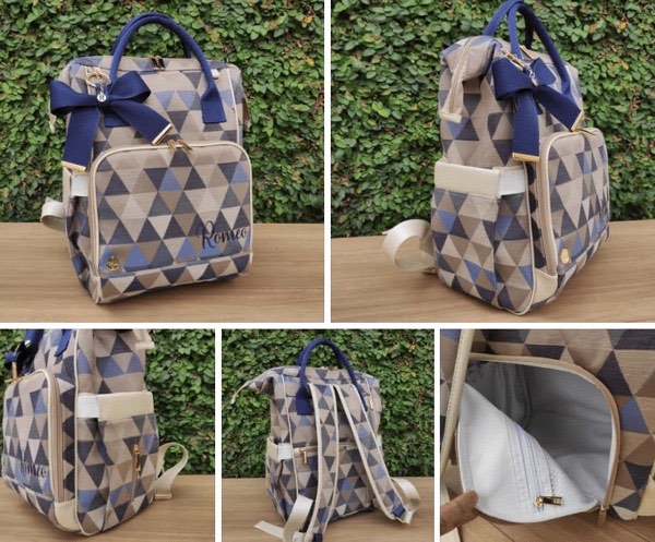Mochila multifuncional em estampa de triângulos, com alça azul-marinho e detalhes bordados